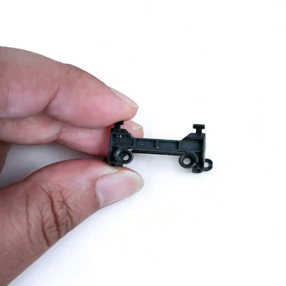 Hand held size reference of DJI Neo gimbal shock absorber bracket
